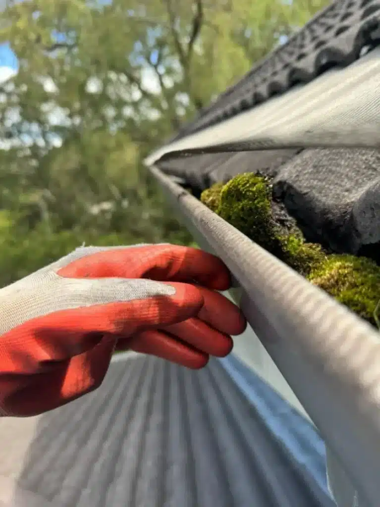 Gutter-Cleaning-With-Gutter-Guards-767x1024